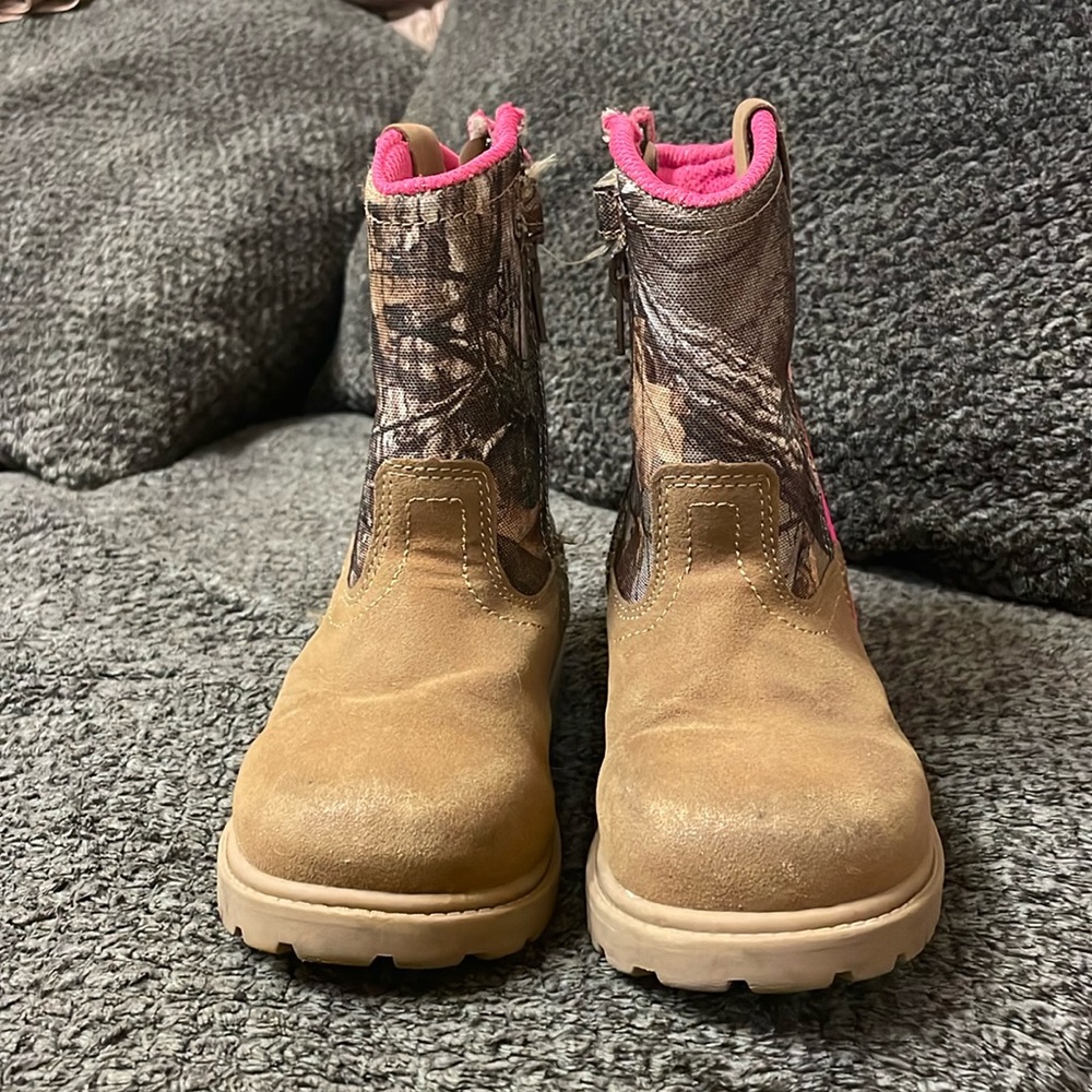 Pink and camo cow girl boots.